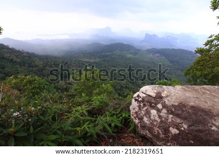 View point at Dragon Crest mountain Krabi Thailand, landscape of tree, mountain from the top of mountain in sunset time
