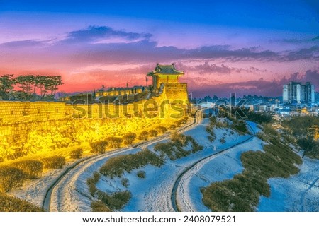 View point during sunset. Landscape of
Hwaseong Fortress is a UNESCO World Heritage Site. Snow-covered winter Suwon Hwaseong Fortress in Suwon Gyeonggi-do, South Korea