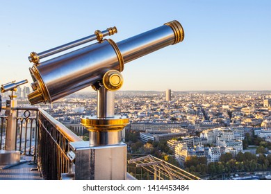 View point with telescope on the Eiffel tower, sunset Paris view