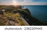 View of Pointe du Hoc in French Normandy at sunset.