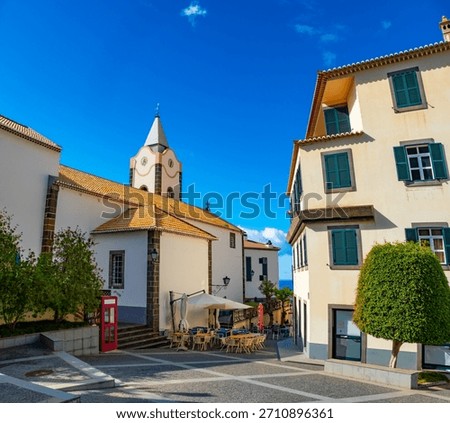 View of Ponta do Sol, a small touristic village in the city of Funchal, main avenue facing the sea, with residential buildings, Madeira Island, Portugal