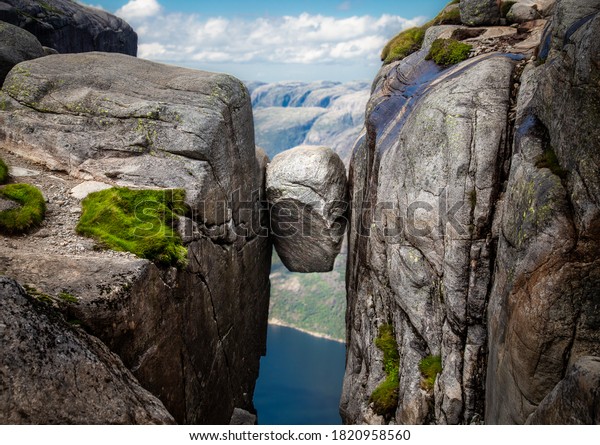 View of popular tourist spot\
Kjeragbolten rock, a large rock wedged between two cliff sides.\

