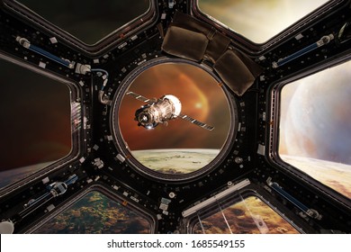 View from porthole. Spacecraft launch into space. Elements of this image furnished by NASA.