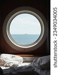 A view from the porthole window of a ferry. Travelling in Sweden