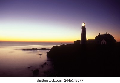 View of Portland Head Lighthouse and lighthouse keepers house at dawn, Cape Elizabeth, Maine, New England, United States of America, North America