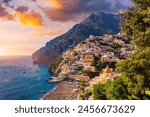 View of Positano with comfortable beach and blue sea on Amalfi Coast in Campania, Italy. Positano village on the Amalfi Coast, Salerno, Campania. Beautiful Positano, Amalfi Coast in Campania.