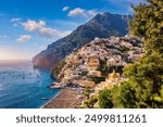 View of Positano with comfortable beach and blue sea on Amalfi Coast in Campania, Italy. Positano village on the Amalfi Coast, Salerno, Campania. Beautiful Positano, Amalfi Coast in Campania.