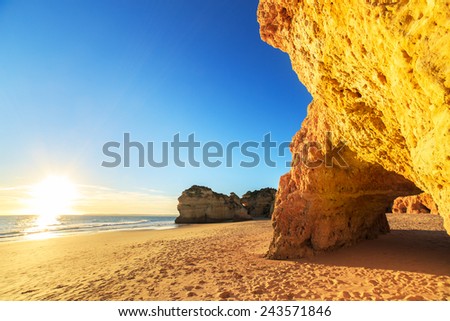 Similar – Image, Stock Photo Sunset reflections at Praia Emilia’s rocky beach