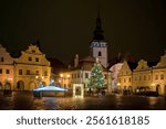 View of the pre-Christmas decorated Masaryk Square in Pelhřimov, illuminated Christmas tree