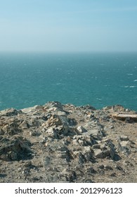 View From The Precipice Of A Mountain Overlooking The Sea Waves That  Strongly Lash The Shore With A Lot Of Foam In Punta Gallinas, Uribia, La Guajira, Colombia 