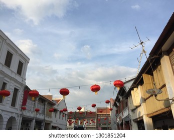 View Of Pre-war South East Asian Shop Houses With Red Lanterns During Chinese New Year Festival