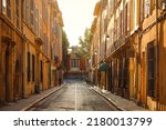 View of provence typical city Aix en Provence with old house facade in the morning