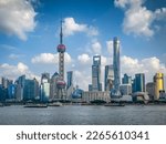 A view of Pudong from The Bund with the Pearl and modern architecture skyline.