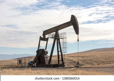 View of Pumpjack (Horsehead) at Daylight Oil Industry