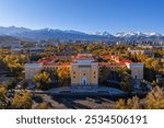 View from a quadcopter of the central part of the Kazakh city of Almaty and the historical building with the inscription Academy of Sciences of the Kazakh SSR in Kazakh and Russian languages