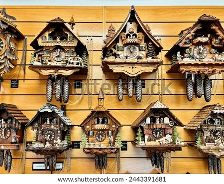View of a quaint Swiss shop, a picturesque array of traditional cuckoo clocks adorns the walls, exemplifying the country's iconic craftsmanship and timekeeping heritage