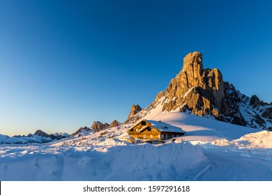 View of Ra Gusela peak in front of mount Averau and Nuvolau, in Passo Giau, high alpine pass near Cortina d'Ampezzo, Dolomites, Italy