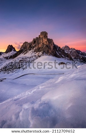 View of Ra Gusela peak in front of mount Averau and Nuvolau, in Passo Giau, high alpine pass near Cortina d'Ampezzo, Dolomites, Italy