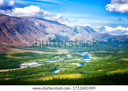 View of the Rai-Iz mountain and the Sob River in the Polar Urals on a sunny summer day, Yamal, Russia