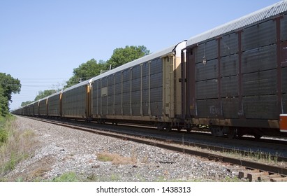 View of a railroad train on a bright day.