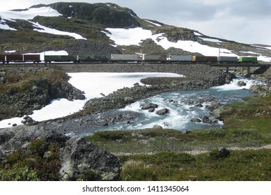 View Of Railway Line On Rallarvegen. Famous Bicycle Trail On Hardangervidda Plateau Leads You Along The Bergen Railway Line From Haugastøl To Flåm. Norway