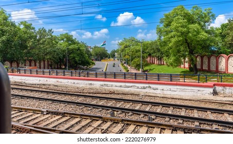 View Of Railway Tracks Overlooking Cityscape. 