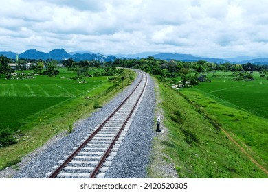 View of railway tracks in rural Indonesia in the afternoon - Powered by Shutterstock