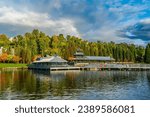 A view of a rainboa over trees at Gene Coulon Park in Renton, Washington.