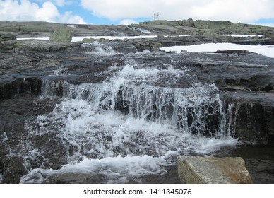 View Of Rallarvegen With  Cascades. Famous Bicycle Trail On Hardangervidda Plateau Leads You Along The Bergen Railway Line From Haugastøl To Flåm. Norway