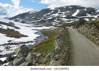 View Of Rallarvegen Road. Famous Bicycle Trail On Hardangervidda Plateau Leads You Along The Bergen Railway Line From Haugastøl To Flåm. Norway