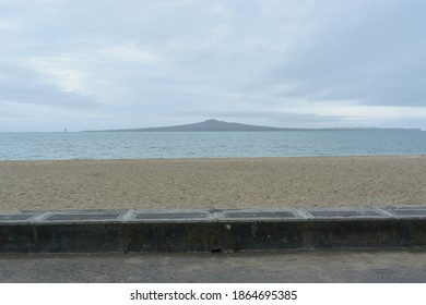 View Of Rangitoto Island On Rainy Day From Mission Bay Beach