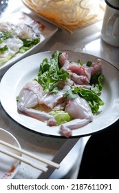 A View Of Raw Frog Meat On A Plate, Part Of A Hot Pot Meal.