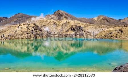 View of the Red Crater Summit Reflected in the Emerald Lakes