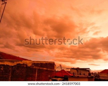  view of reddish yellow patterns in the sky when the sun is about to set in Indonesia in the city of Bandung