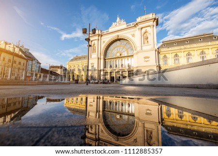 View with reflecdtion on the eastern railway station during the sunset in Budapest city, Hungary