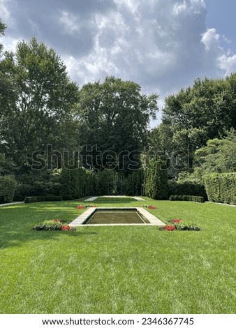 View of the reflection pool in the formal garden at the Edsel and Eleanor Ford House and estate in Grosse Pointe Shores, Michigan.