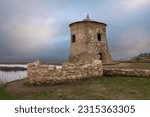 View of the remains of a fortified settlement on the bank of the Kama River - a white stone tower on the Yelabuga (Devil