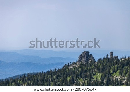View from the remnants pillars on Mount Zelenaya. Sheregesh, Russia