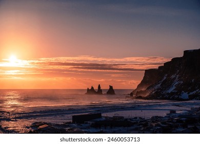 View of Renisfjara from Vik, black beach, rocks, basalt, sunset, sea view - Powered by Shutterstock
