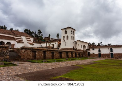 View Of The Restored Central Square With A Church And Bell Tower In The District Of Chinchero, Peru