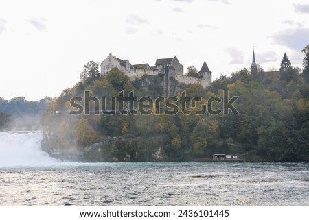 View of Rhein Fall is famous and beautiful in autumn season at Rhein Fall, Switzerland