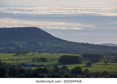 View of the Ribble Valley from the top of Clitheroe castle. Longridge fell in summer with a green landscape