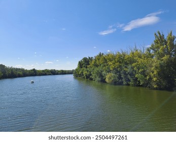 view of the river from above, river bend, forest, sky - Powered by Shutterstock