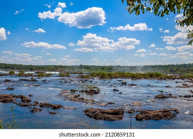 View Of The Iguaçu River, Border Between Brazil And Argentina, Above The Iguaçu Falls. The Falls Are One Of The Seven Wonders Of The World And Are Located In The Iguaçu National Park.