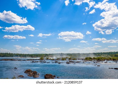 View Of The Iguaçu River, Border Between Brazil And Argentina, Above The Iguaçu Falls. The Falls Are One Of The Seven Wonders Of The World And Are Located In The Iguaçu National Park.