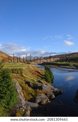 a view of the river Claerwen leading down the Elan valley just after the Claerwen dam