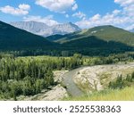 View of river, forest, foothills and mountains all in one