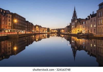 A View of the River Lee in Cork City, Ireland at Night. - Shutterstock ID 324163748