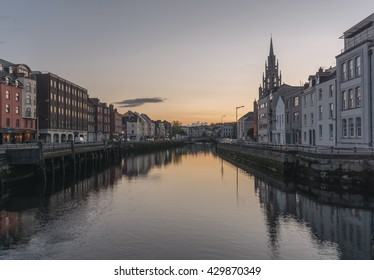 A View Of The River Lee In Cork City, Ireland At Night.