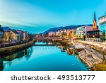 view of a riverside of river Drau during sunset in Villach, Austria